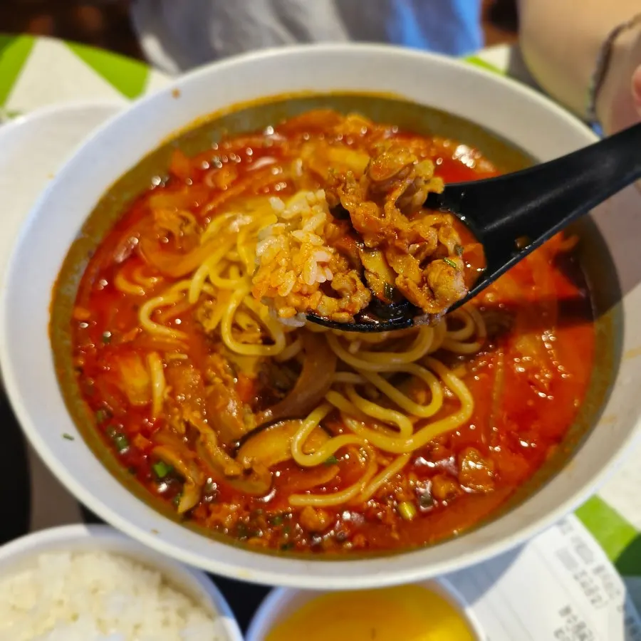 Tantanmen noodles topped with minced meat