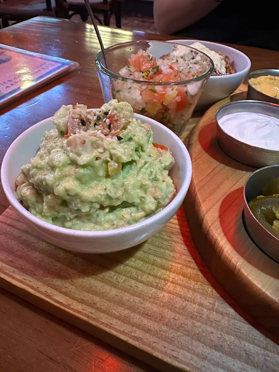 A variety of taco sauces prepared for the meal