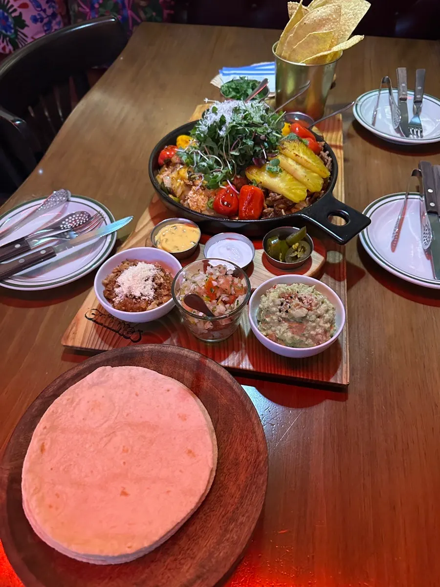 The taco plate with beef, pork, and chicken divided into thirds