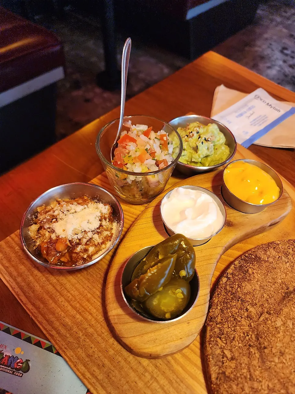 A plate of the taco plate with meat and seafood