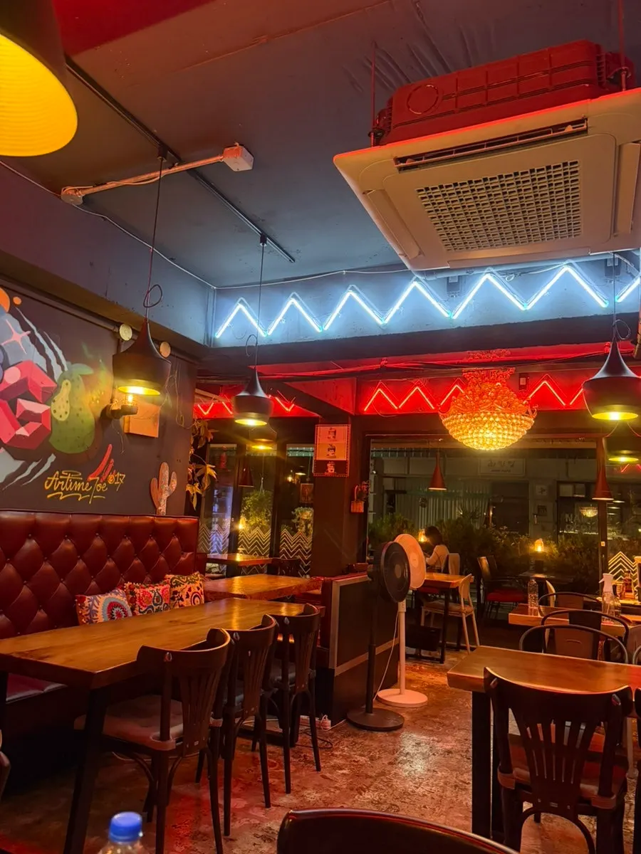 Entrance to Chilango with outdoor tables in front