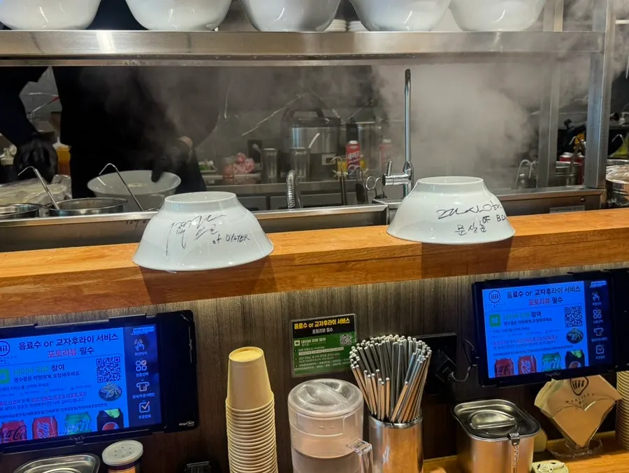 Cooking area in front of the bar counter