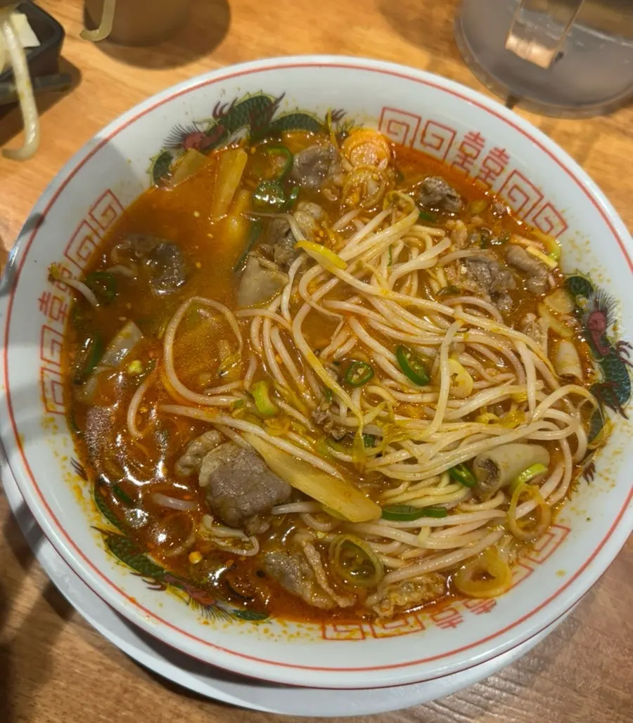 Motsu ramen topped with Cheongyang peppers and beef offal