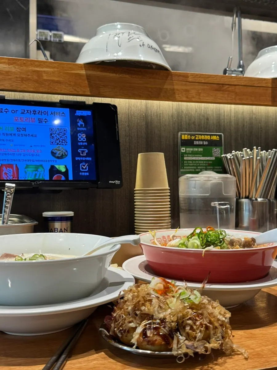 Finishing a ramen meal