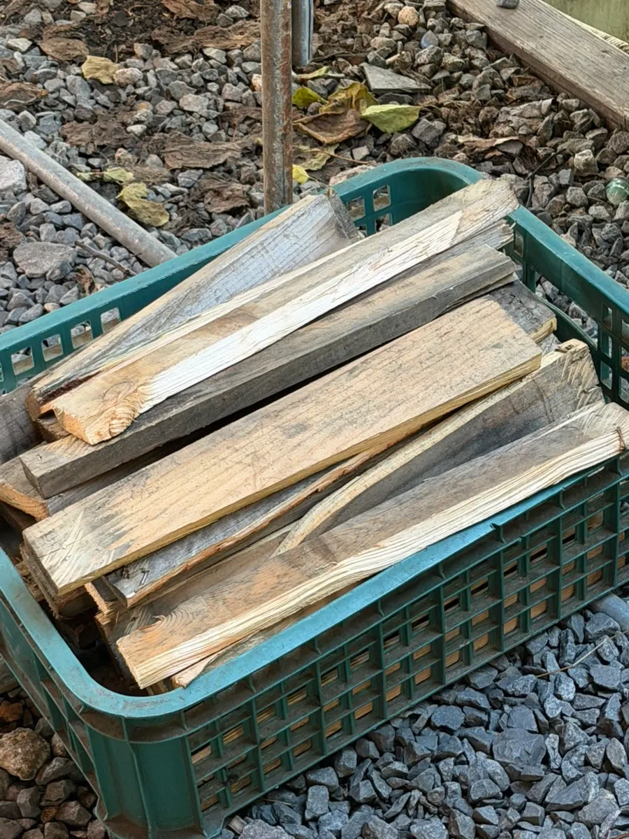 Outdoor stone-griddle table with the fire lit in advance