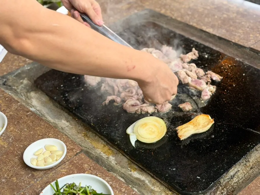 Duck cooking on the stone griddle