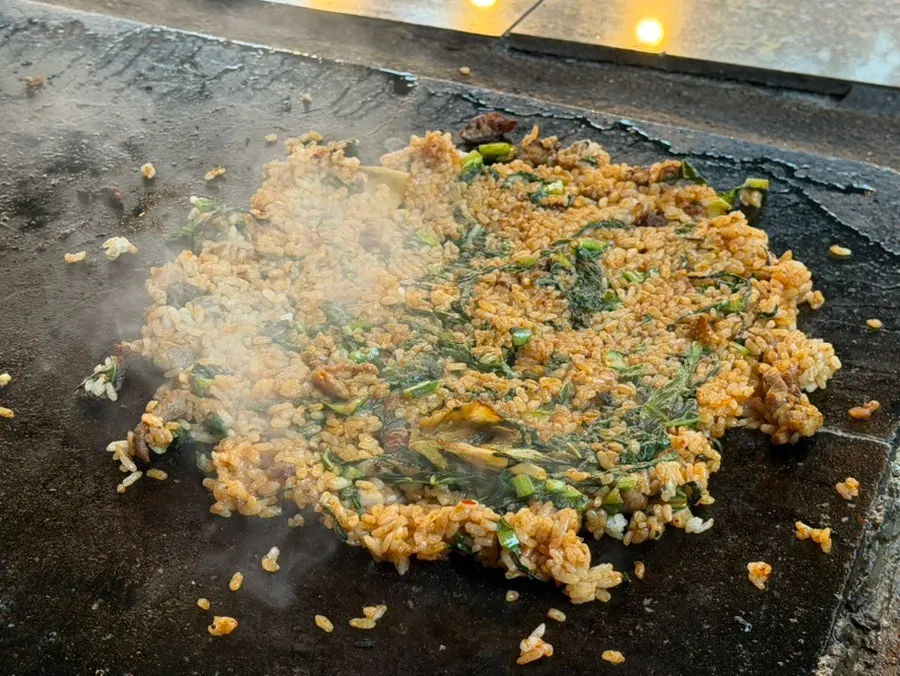 Fried rice stir-fried on the stone griddle