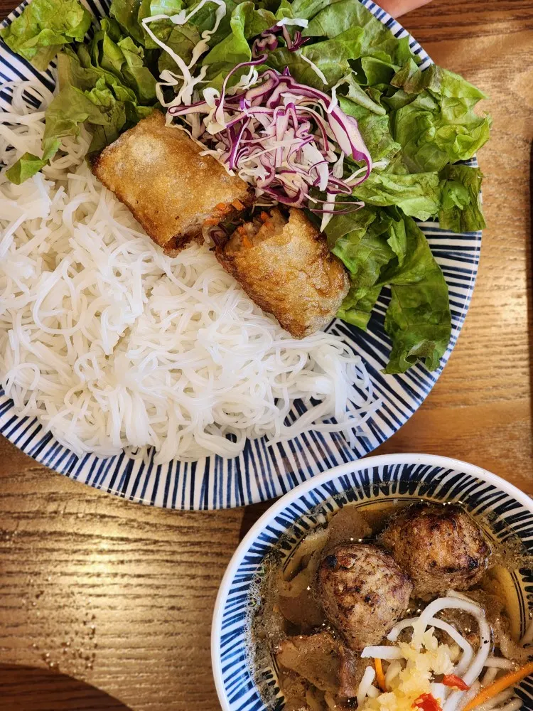 Banh xeo with bean sprouts and shrimp, plus dry rice paper wraps