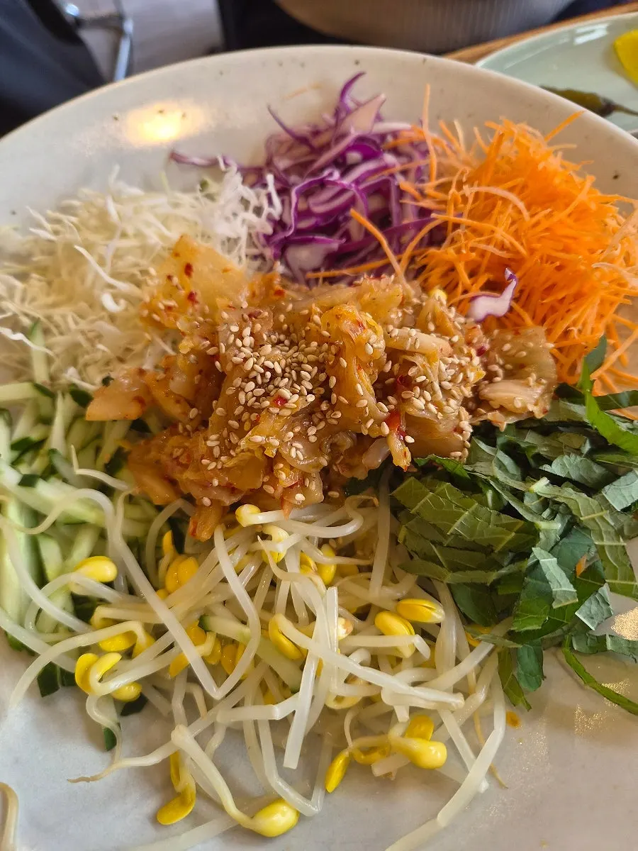 Perilla oil aged-kimchi bibimbap topped with plenty of vegetables