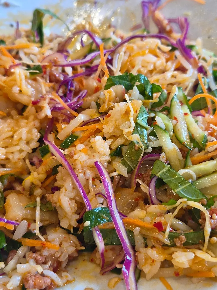 Spoonful of perilla oil aged-kimchi bibimbap