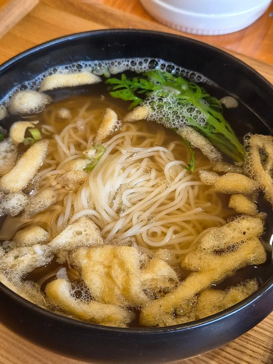 Bowl of cauldron-cooked fresh noodle soup at Chilseong Jemyeonso