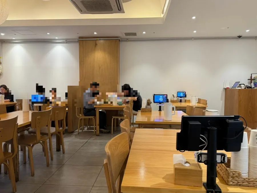 Interior of the restaurant as customers start filling in for dinner