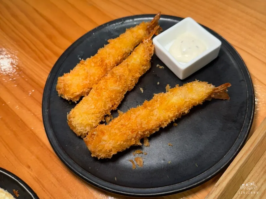 A plate of fried shrimp ordered alongside the meal
