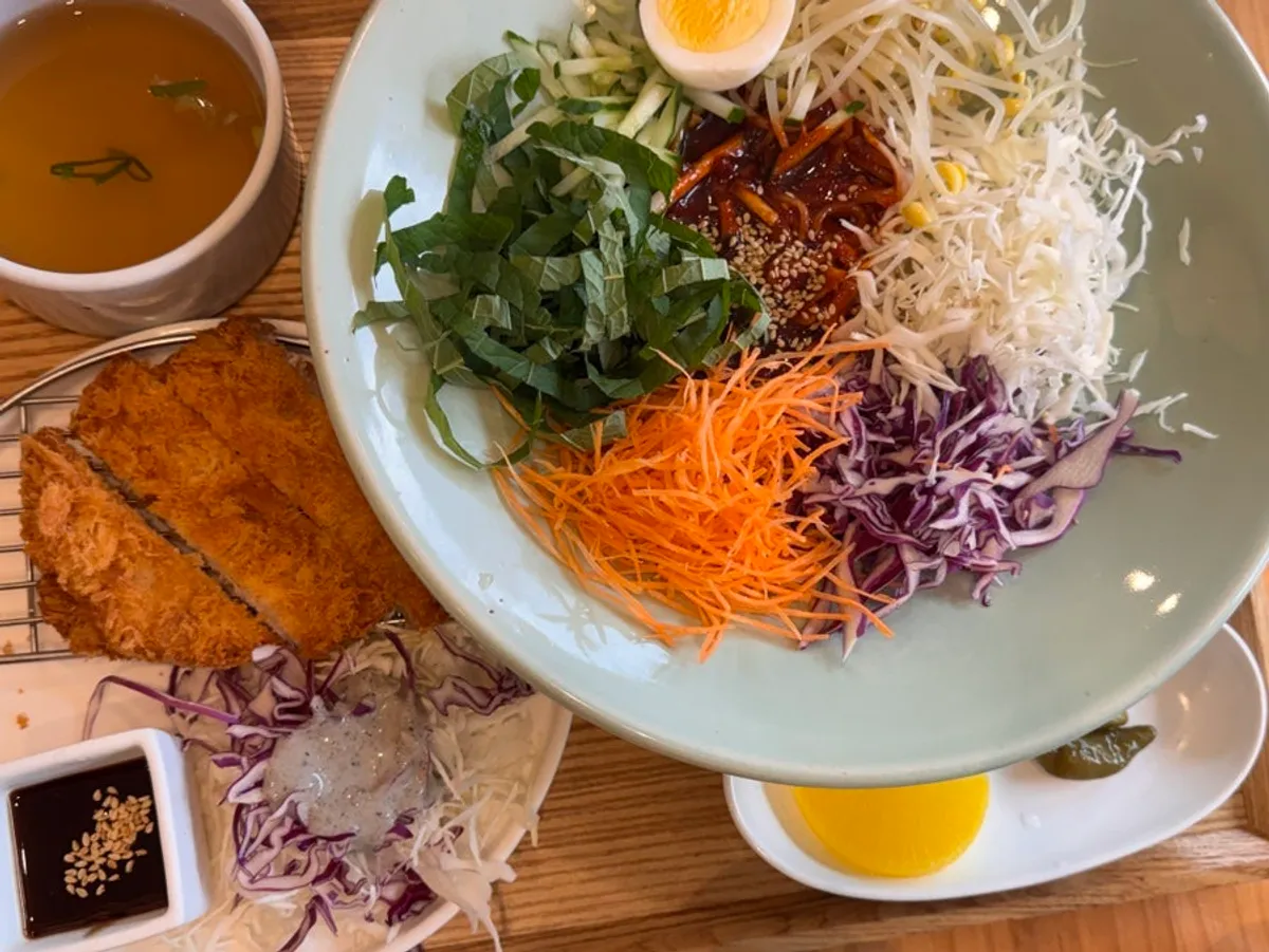 Full table spread of the Chilseong bibim jjolmyeon set