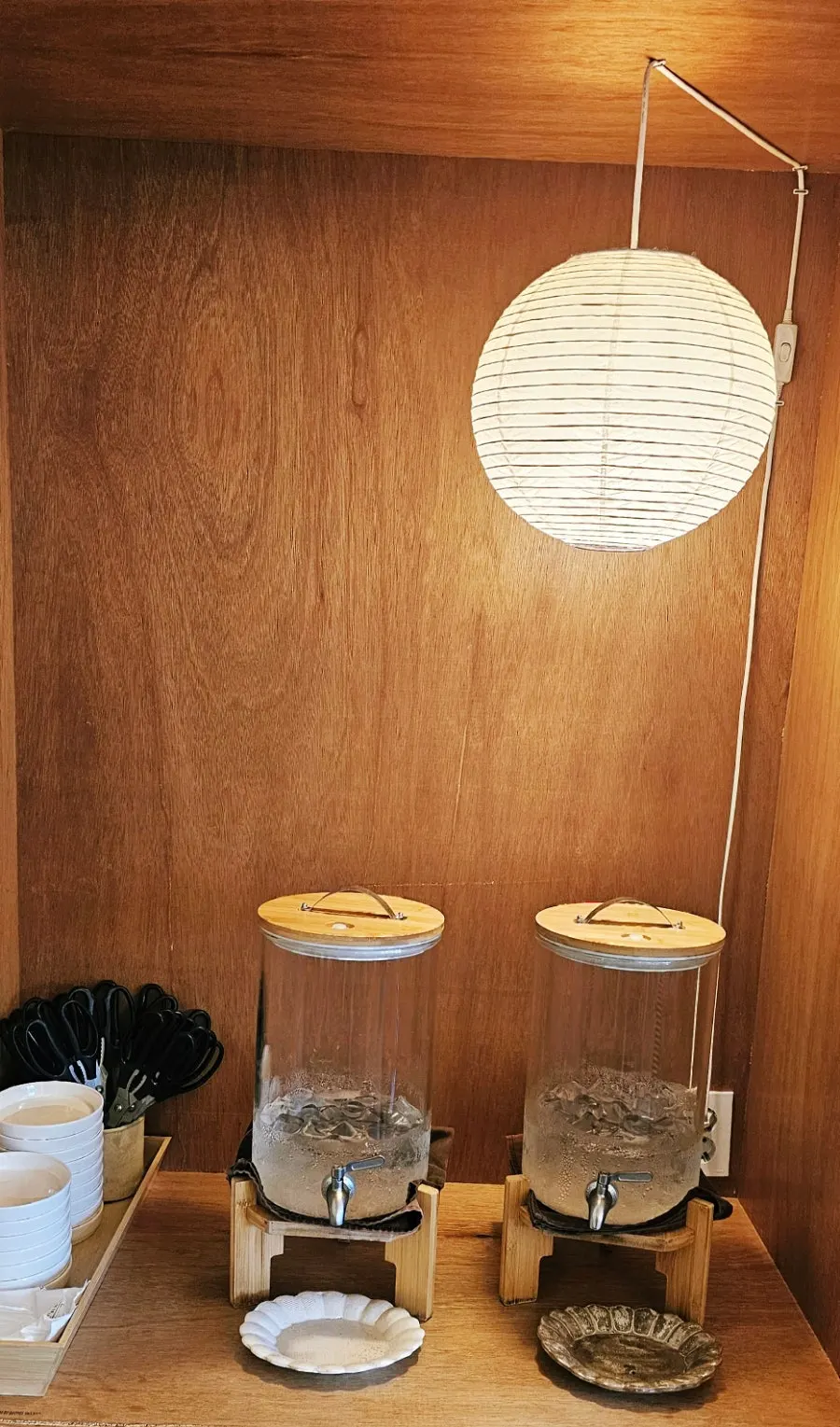 Interior with moon-jar-shaped light fixture