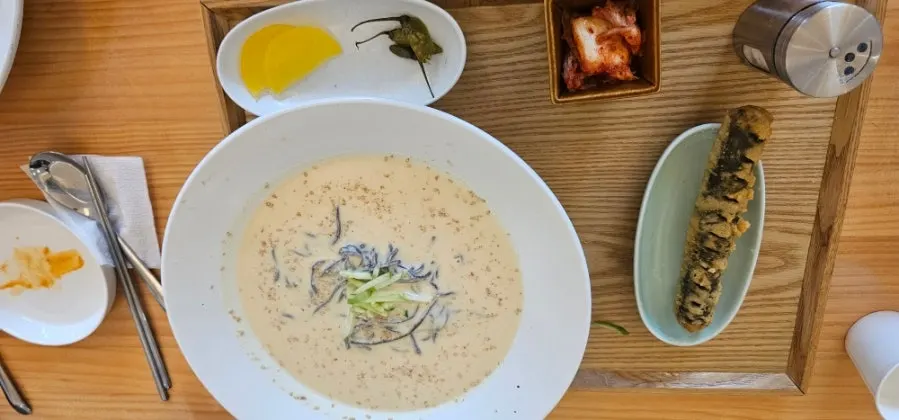 Tray of handmade buckwheat soy milk noodles and fire chicken kimmari