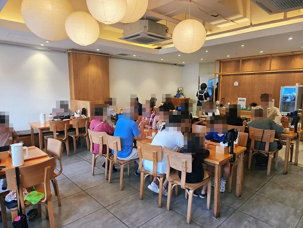 Bright, clean interior seating at Chilseong Jemyeonso Suji Main Branch