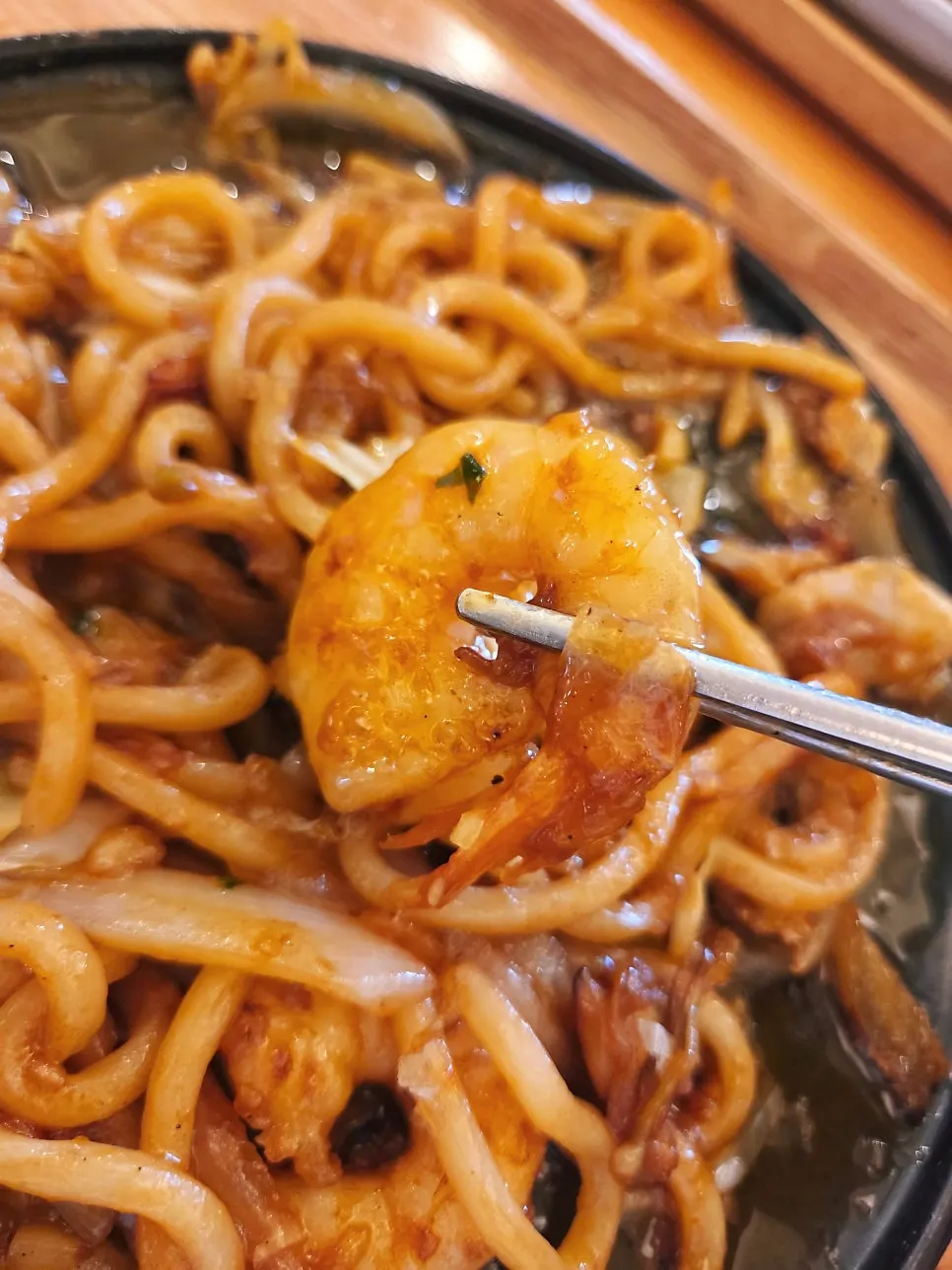 Close-up of the smoky seafood yaki udon