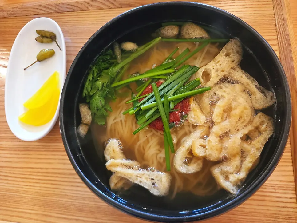 Warm broth of the spicy hangover fresh noodle soup