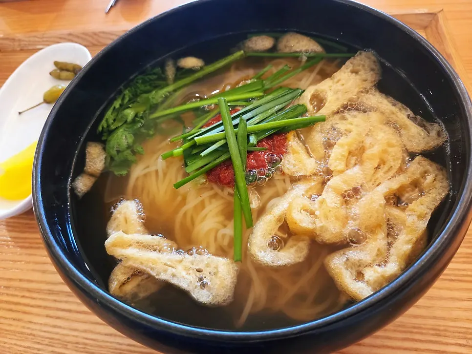 A bowl of spicy hangover fresh noodle soup