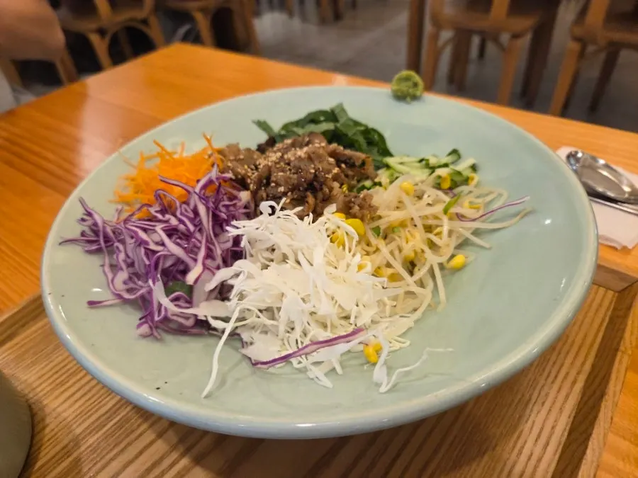 A generously filled bowl of charcoal beef short rib bibimbap