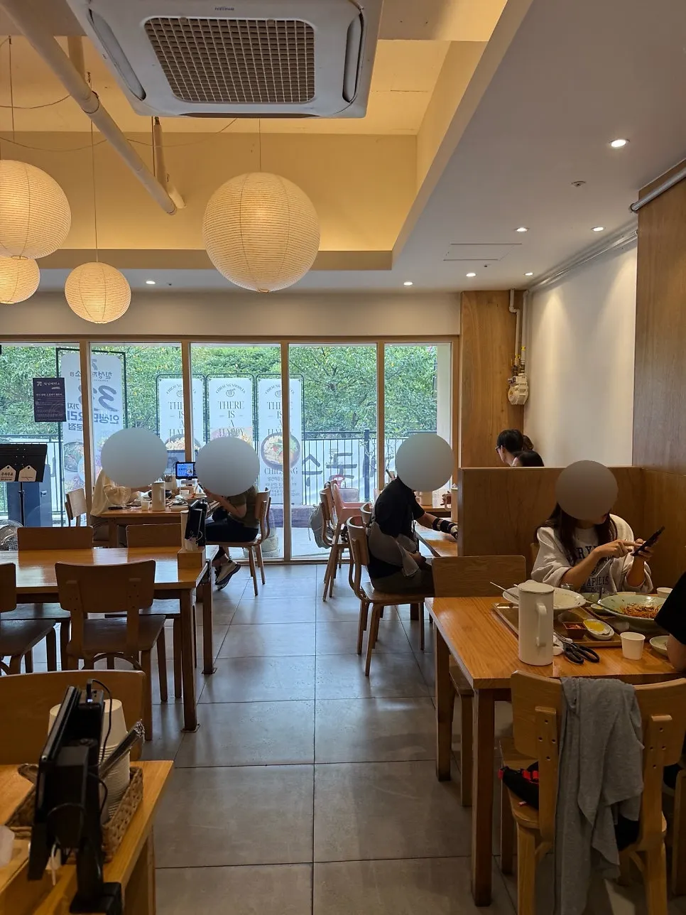 Interior of Chilseong Jemyeonso Suji Main Branch full of weekday lunch customers