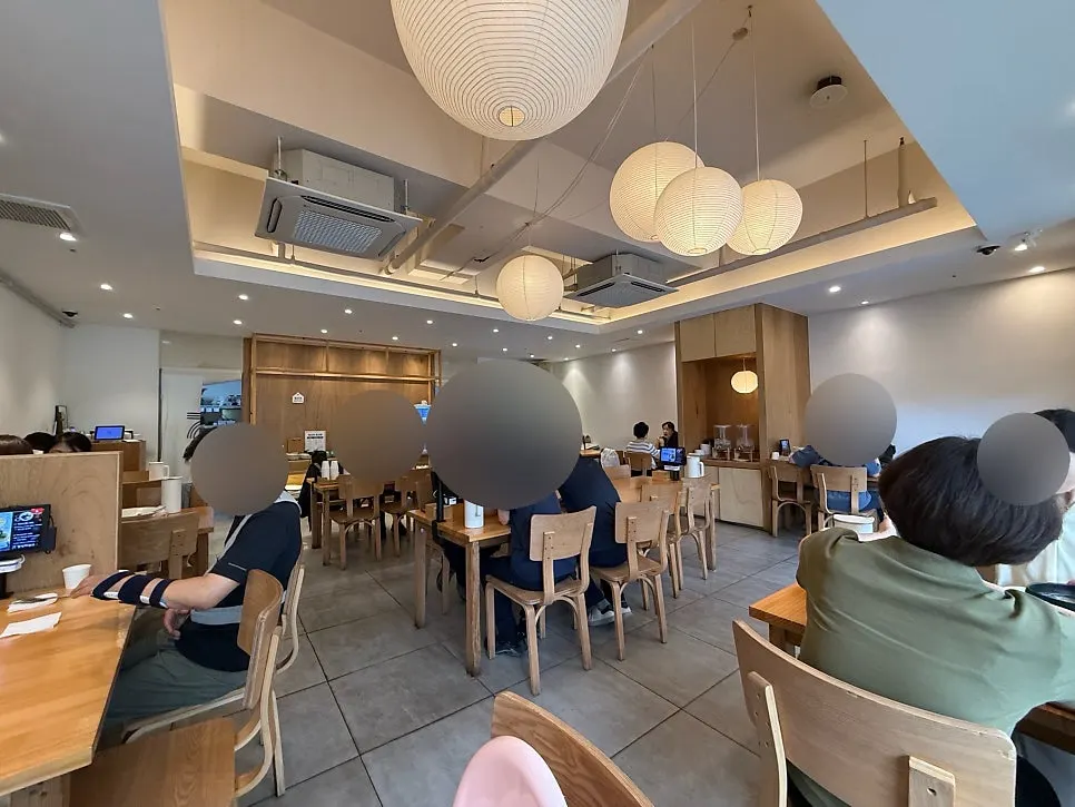White-wood toned dining hall at Chilseong Jemyeonso Suji Main Branch