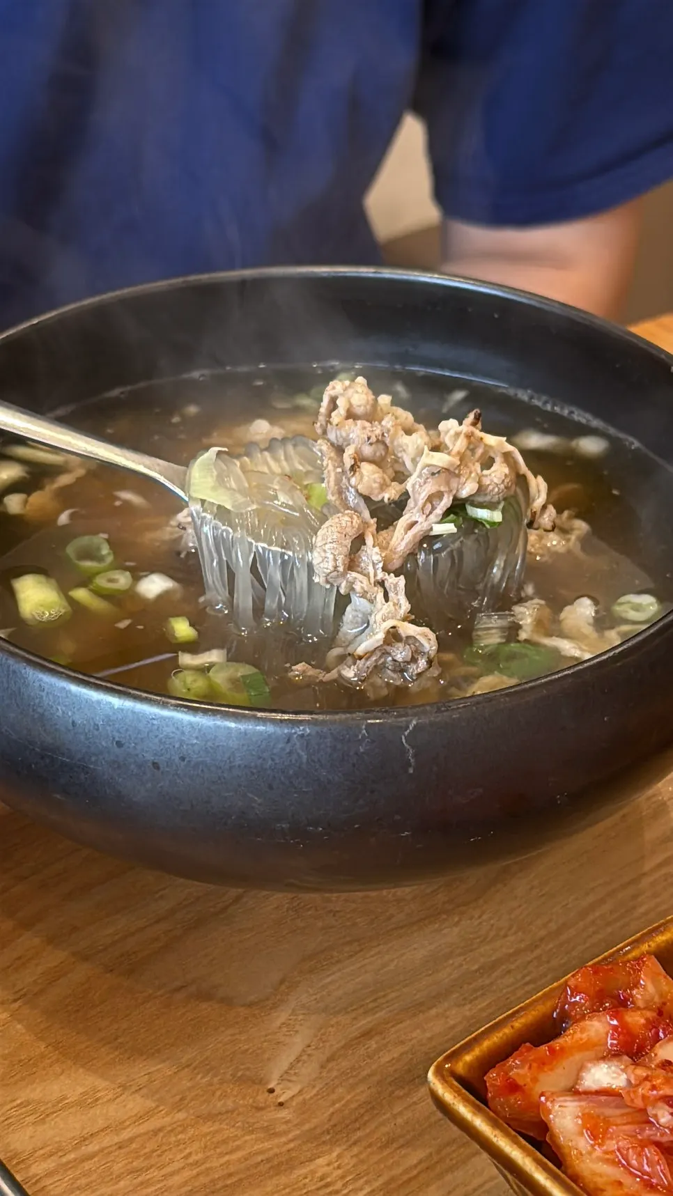 Inside the charcoal beef gukbap, full of glass noodles