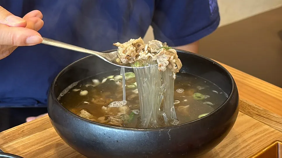 Table set with the charcoal beef gukbap