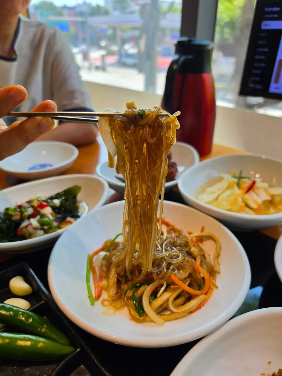 Basic side dishes served in white porcelain bowls