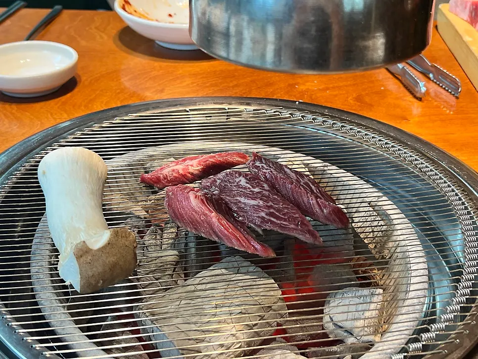 Beef placed on the charcoal grill