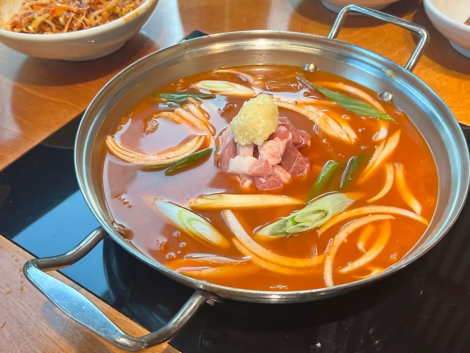 Pork kimchi stew simmering on the grill