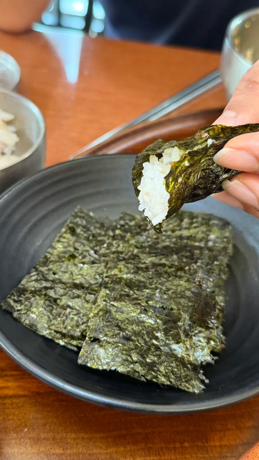White rice wrapped in seaweed from the self-serve bar with soy sauce