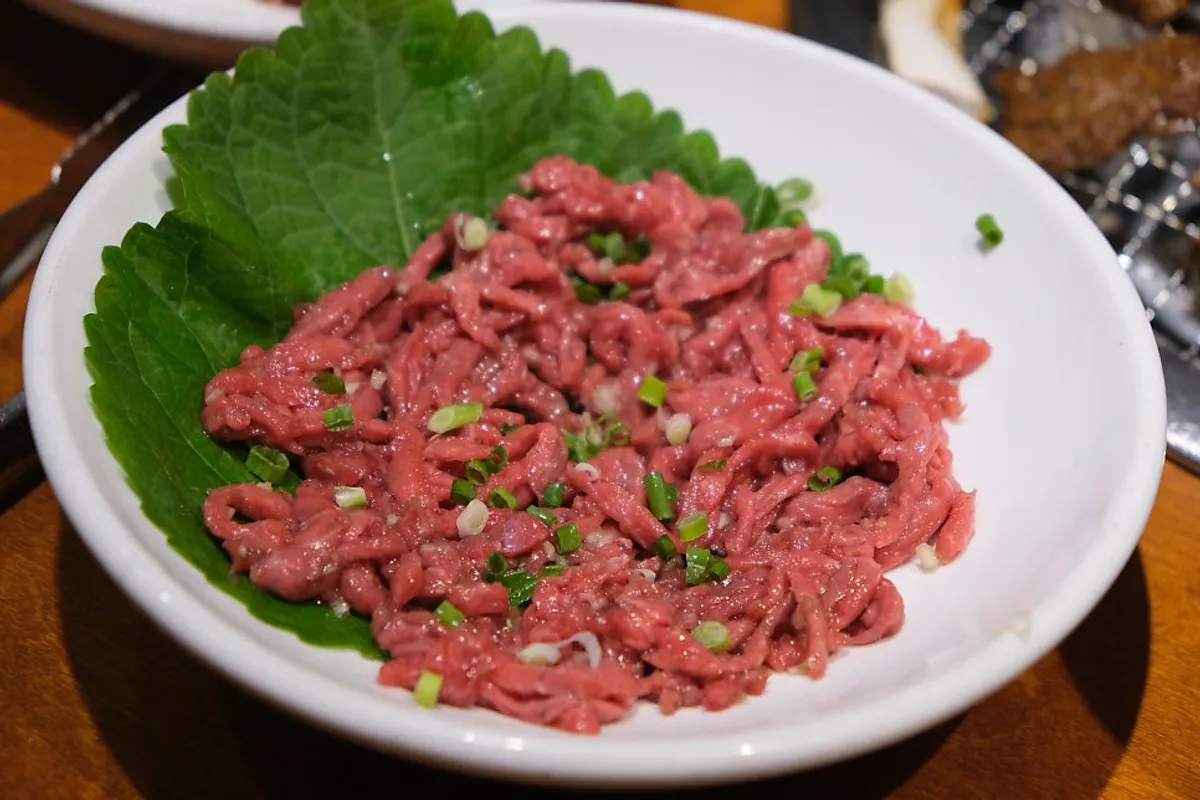 Full 9-course set spread with beef tartare, wasabi sushi, kimchi stew and jjolmyeon