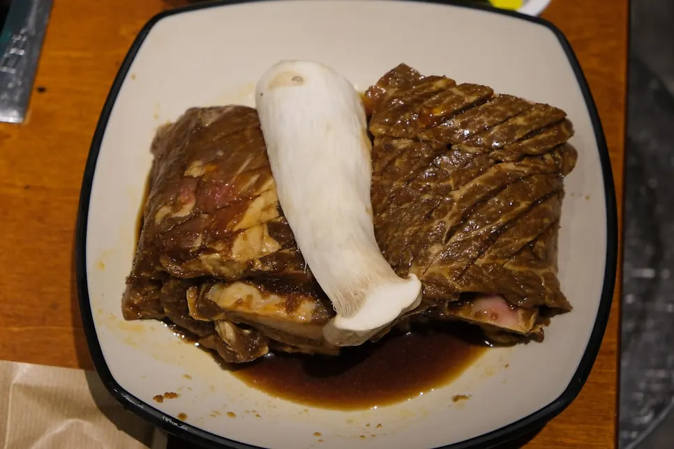 Seokcheong galbi on the grill