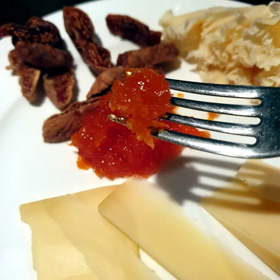 Close-up of the cheese platter enjoyed with wine