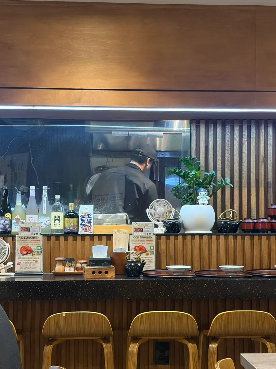 Interior with Japanese restaurant vibe and bar seating