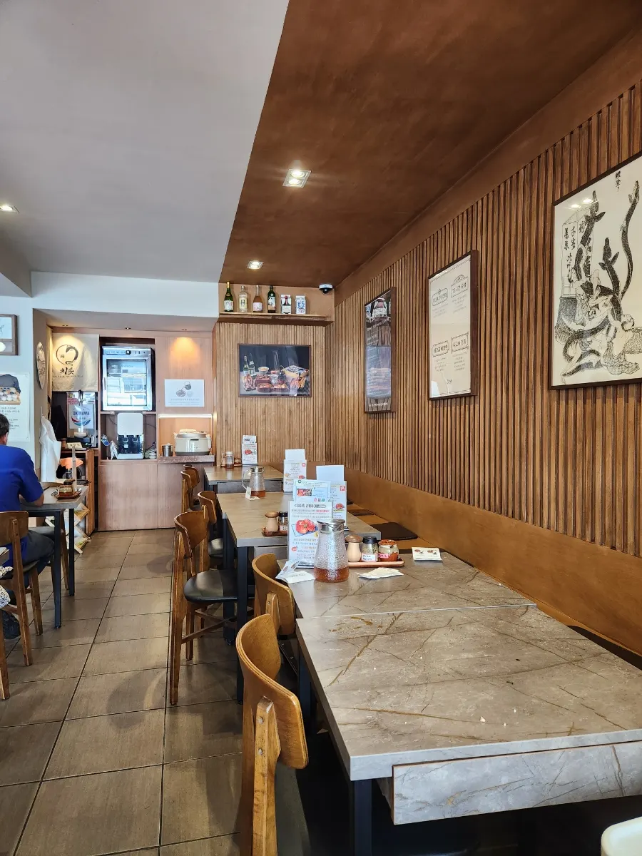 The warm wood-based interior of the Japanese-style restaurant