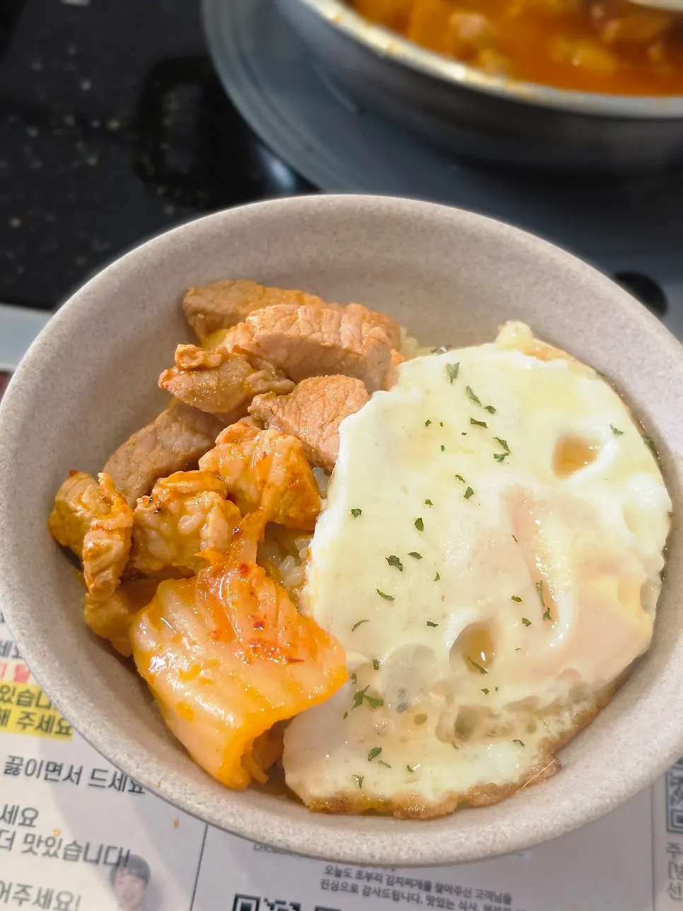 Rice, kimchi jjigae, and fried egg combination