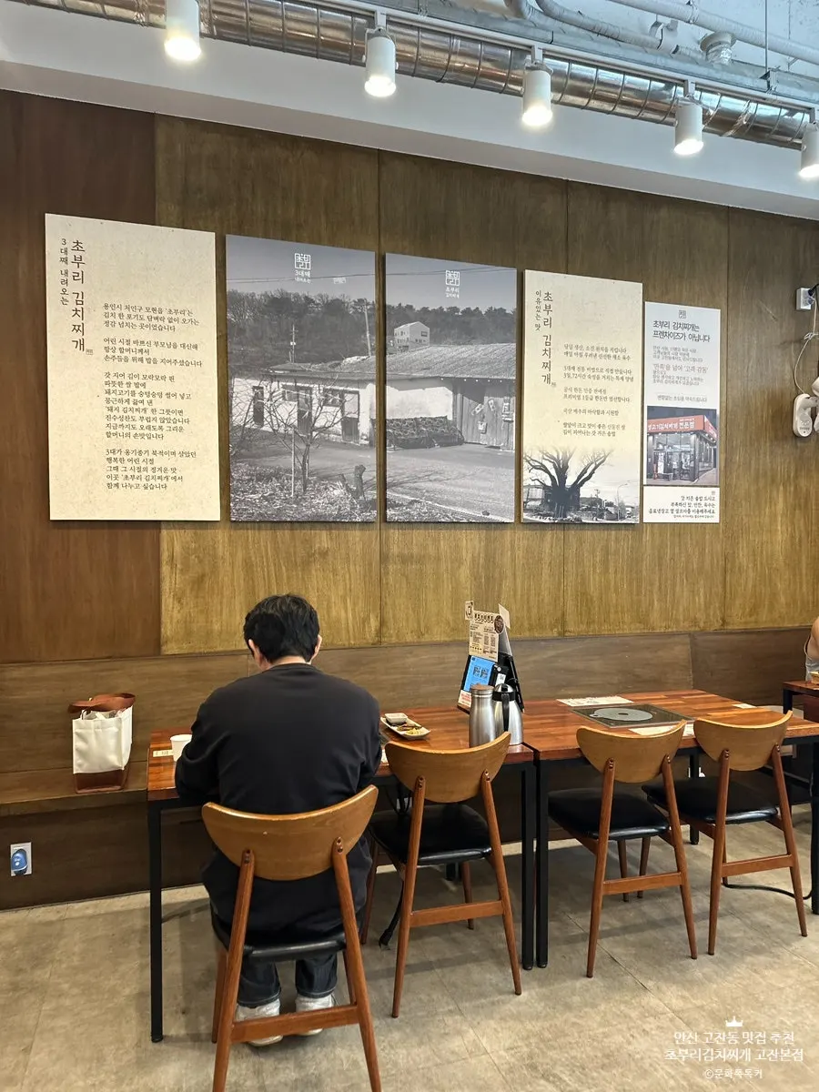 Cushioned booth seating at a back table
