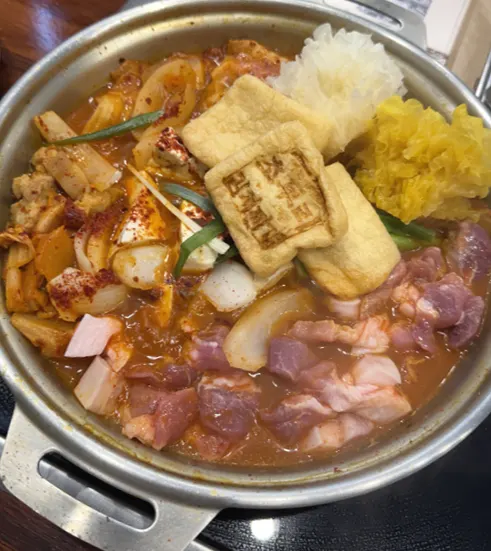 Kimchi jjigae with the hearty meat topping added