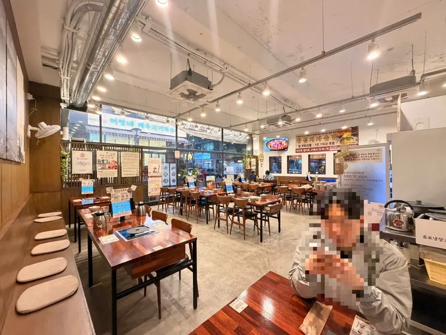 Interior of Choburi Kimchi Jjigae with wide table spacing