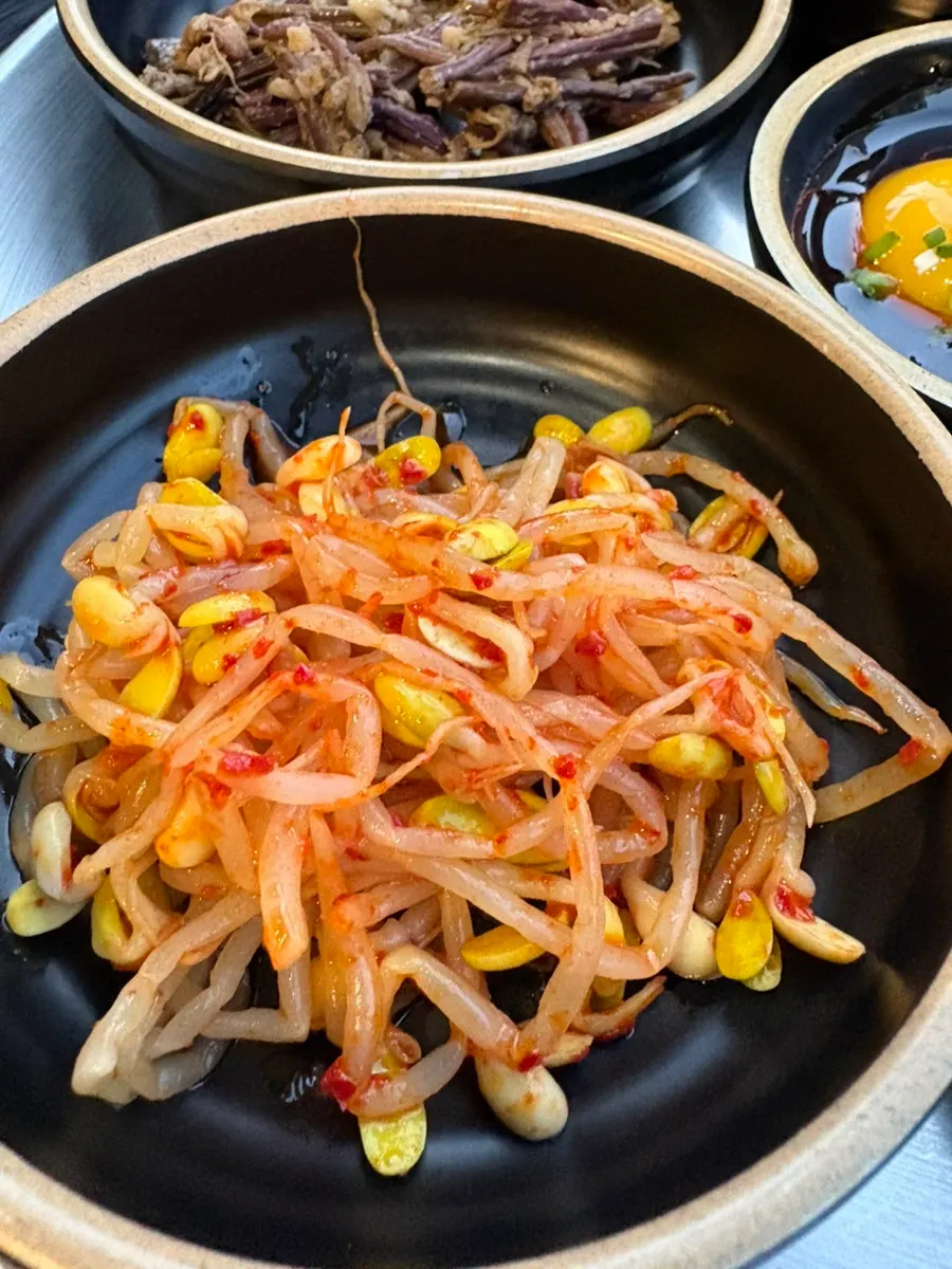 Table spread with Chodaebak Naengsam side dishes