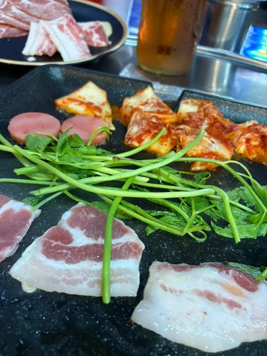 Self-serve bar with sauces set up at Chodaebak Naengsam