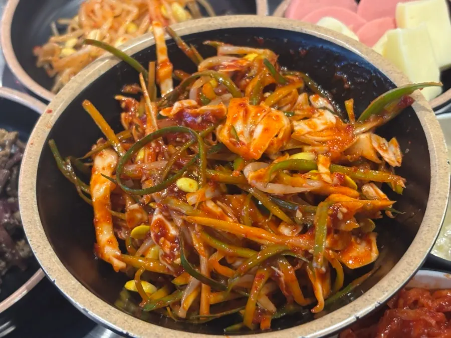 Scallion salad served with the meat
