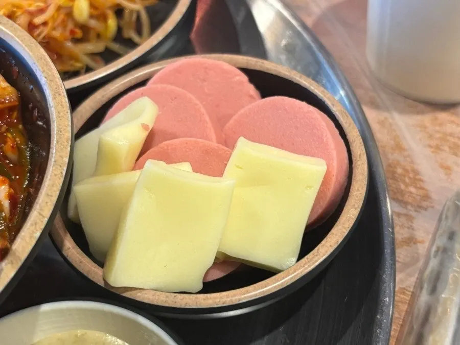 Pink sausage and a taste of cheese