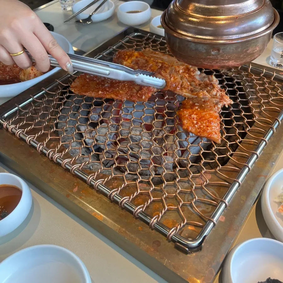 Close-up of beef tripe coated in red seasoning