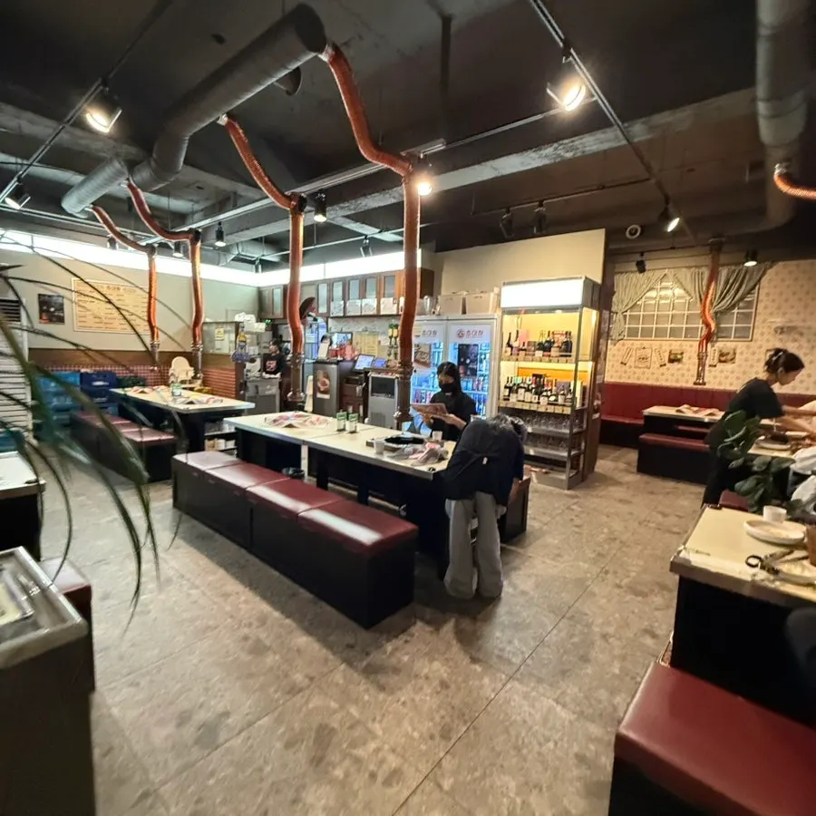 Spacious, clean dining hall interior at Chodaechang Baekseok Branch