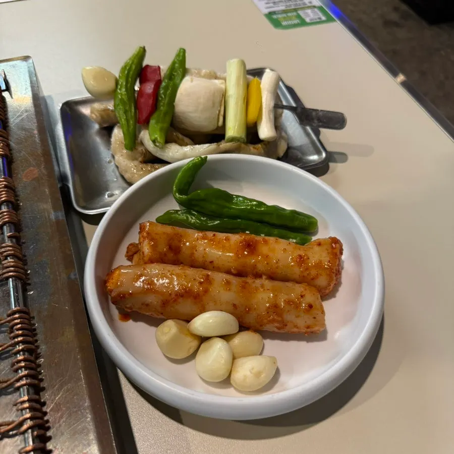 2 servings of gopchang and 1 serving of daechang plated at Chodaechang Baekseok Branch