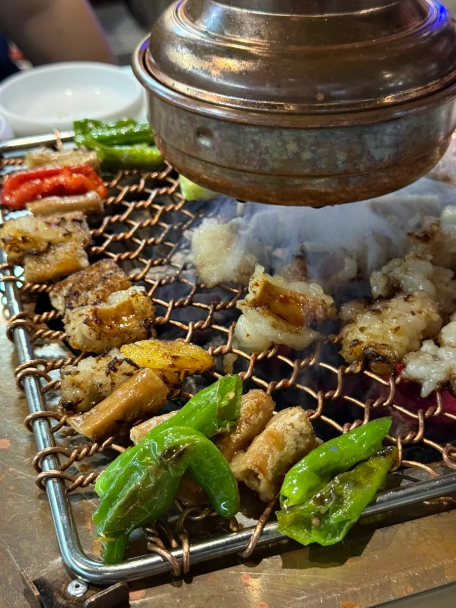Grilled gopchang and daechang being picked up